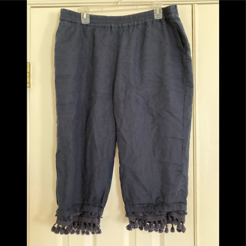 Navy blue crown and ivy pants with fringe bottom